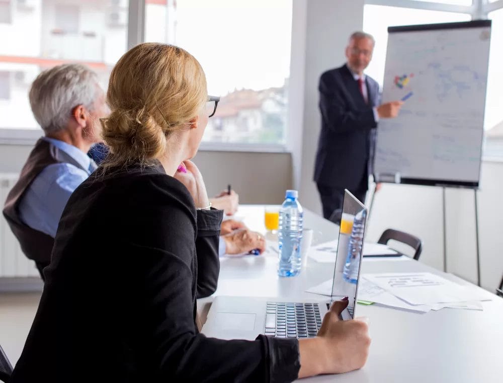 Advisor at a whiteboard